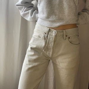 Vintage Levi Jeans. Size 27, Wide leg. Urban renewal. Cream color. Raw hem.
